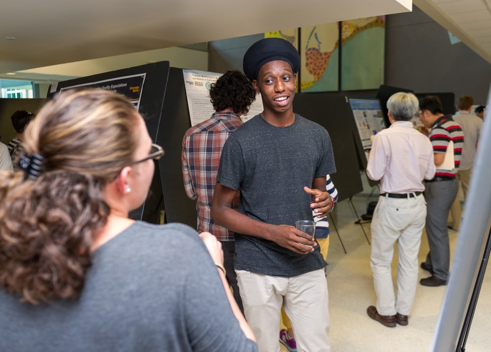 Postdoc presenting research at Georgia Tech Postdoctoral Research Symposium