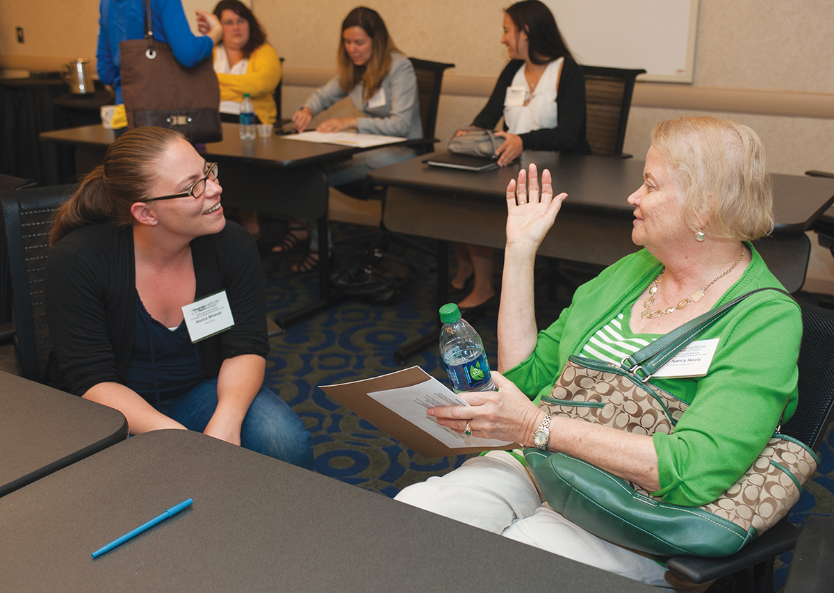 Jessica Weaver, a postdoctoral fellow in the Petit Institute for Bioengineering and Bioscience, talks with Nancy Healy, director of the National Nanotechnology Infrastructure Network Education and Outreach Office in the Institute for Electronics and Nanotechnology.